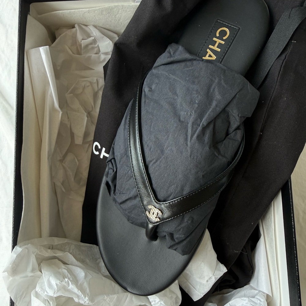 CHANEL Black Leather Logo Thong Sandals with Gold CC Accent